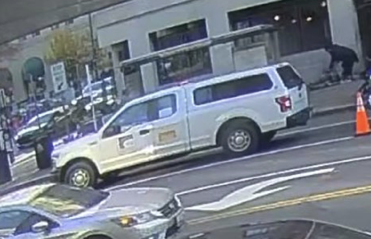 Lakanwal allegedly bending down in front of shot national guard troops, Beckstrom and Wolfe after being shot. (Superior Court for the District of Columbia Criminal Division)