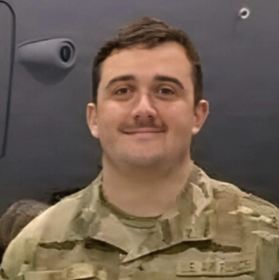 Air Force Staff Sgt. Andrew Wolfe poses for a photo while in his military uniform. (Department of War)