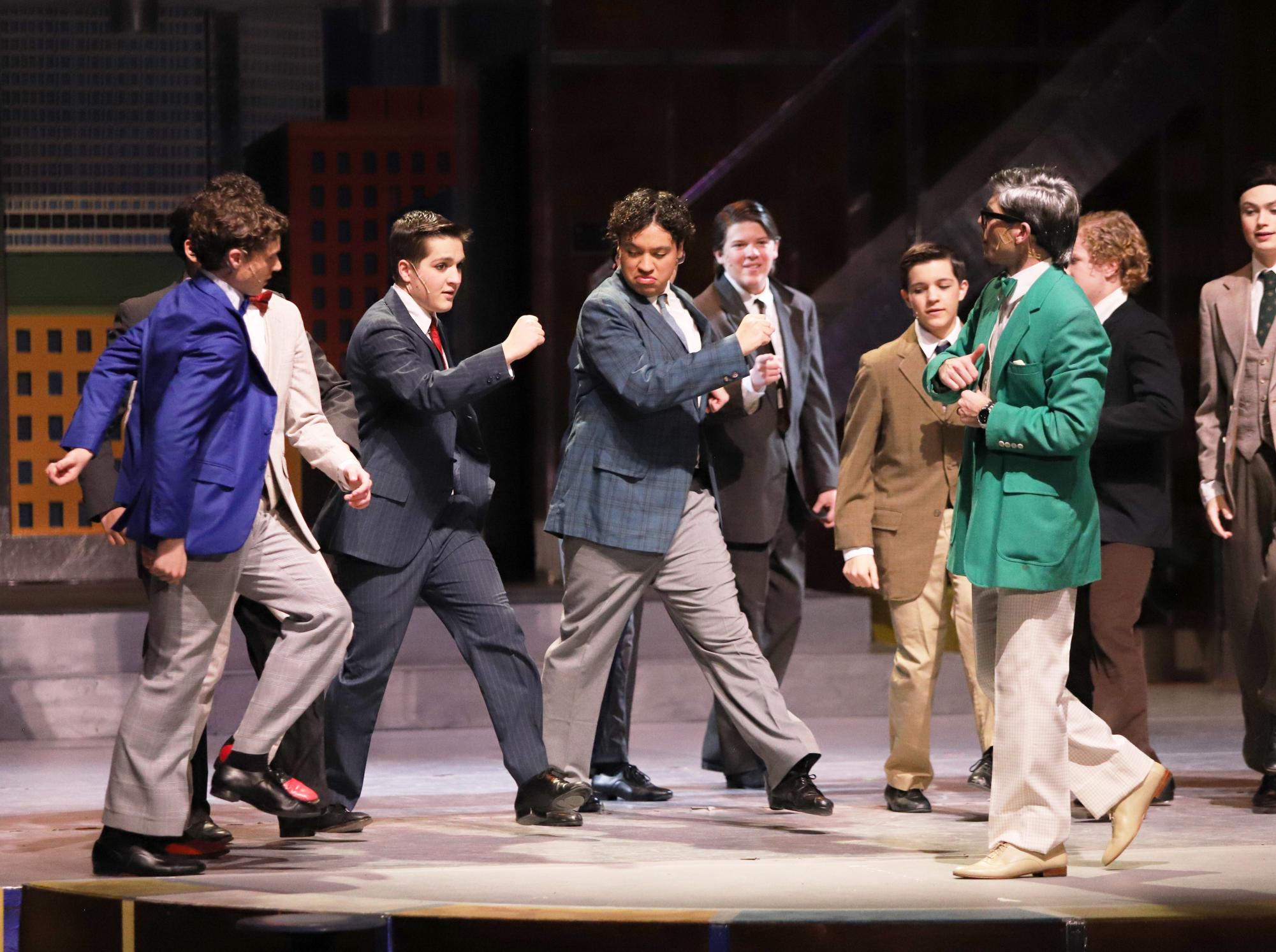 Actors move through a scene.