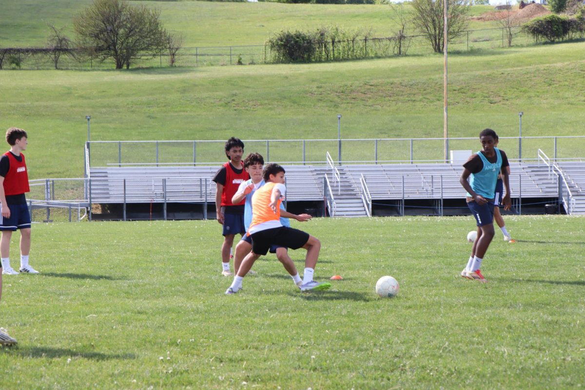 Players practice defending against misdirection, staying low and focused on the ball. "You have to watch their hips, not just the ball, pr they'll fake you out" Sophomore Christopher Olivares shares.