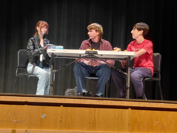 Junior Jo Greathead, junior El Norment, and freshman Jackson Prins eating lunch in Reel Times at Somerset High