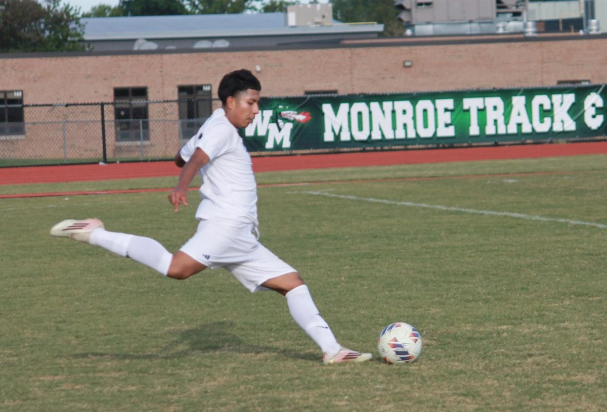 Sophomore Alfredo Rivero-Rodriguez taking a shot from outside the box.
