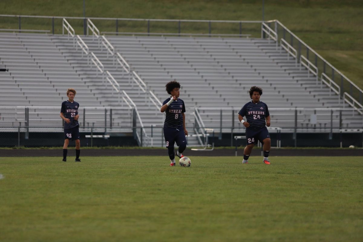 Freshmans Carlos Mercado, Alan Rios and Eighth grader Arrington Fornadel ready to defend.