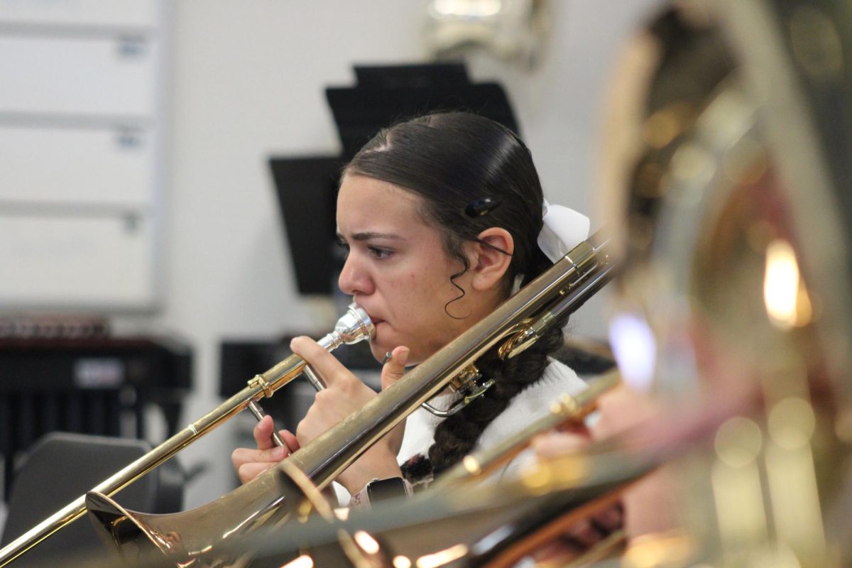 Freshman Mia Perez plays her trombone